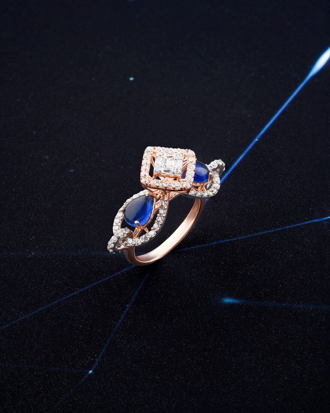 A sapphire and diamond ring catching the light